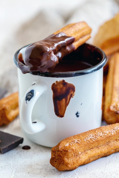 Traditional spanish churros dessert with hot chocolate