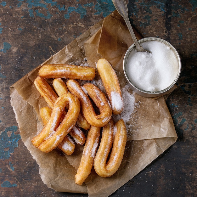 Traditional spanish churros with sugar