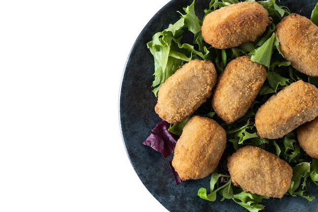 Traditional spanish fried croquettes isolated on white background