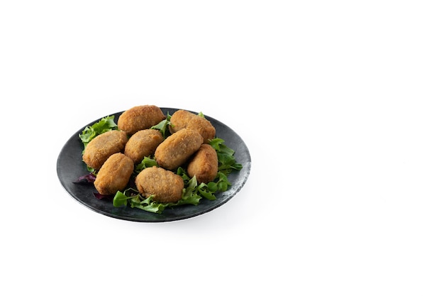 Traditional spanish fried croquettes isolated on white background