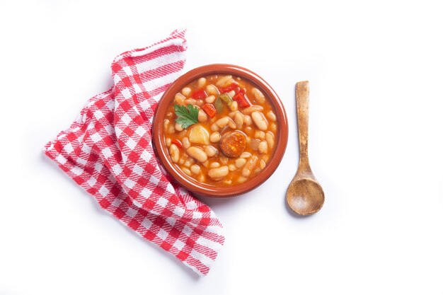 Traditional Spanish white bean stew isolated