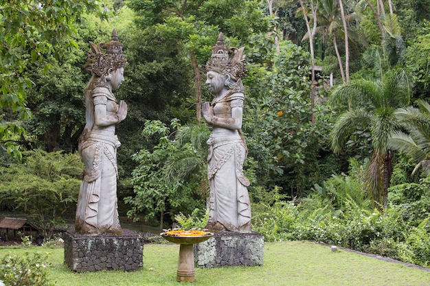 Traditional stone sculpture in garden Island Bali Ubud Indonesia