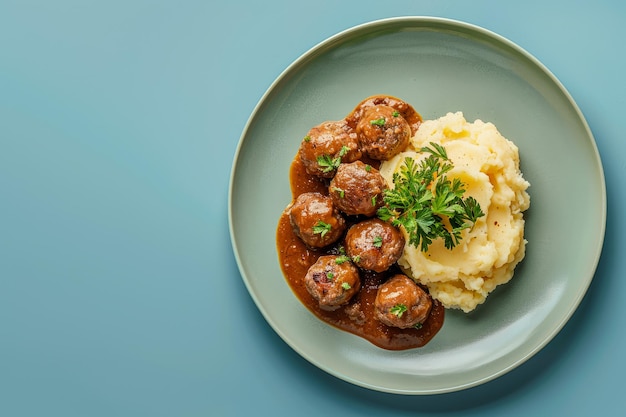 Traditional swedish meatballs with meat sauce and mashed potatoes on a plate Kottbullar