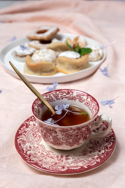 Traditional tea with mint and assorted Arab sweets