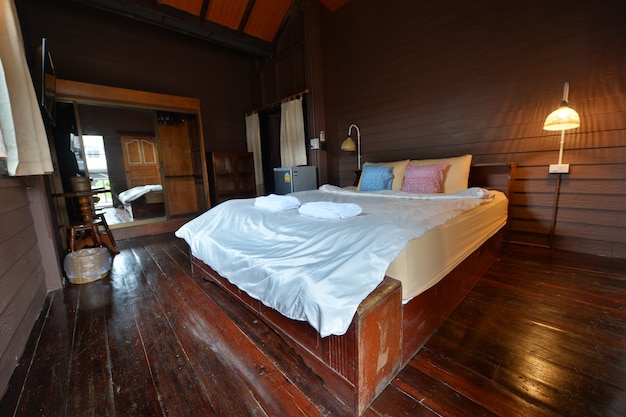 Traditional Thai style wooden bedroom