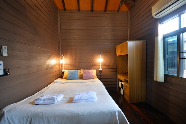 Traditional Thai style wooden bedroom