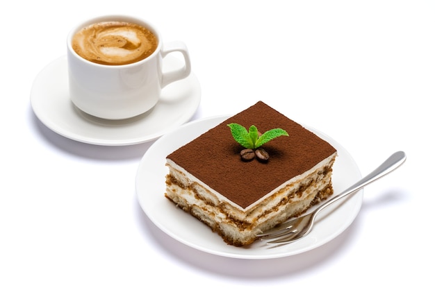 Traditional tiramisu dessert on a ceramic plate