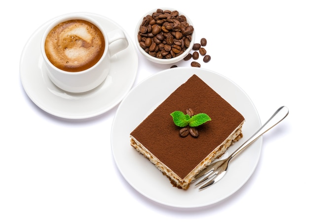 Traditional tiramisu dessert on a ceramic plate