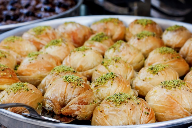 Traditional Turkish baklava sweets in the open buffet in a hotel in Turkey