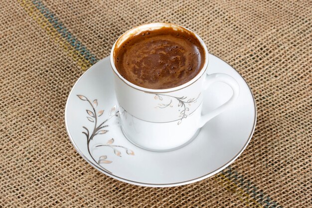 Traditional Turkish coffee on burlap