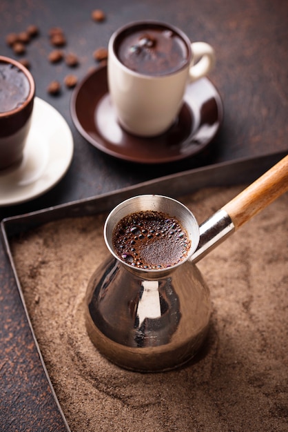 Traditional turkish coffee prepared on hot sand