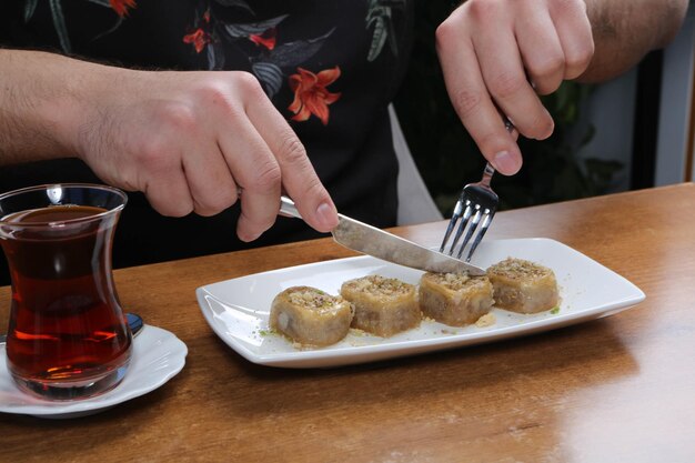 Traditional turkish dessert baklava with cashew walnuts Homemade baklava with nuts and honey