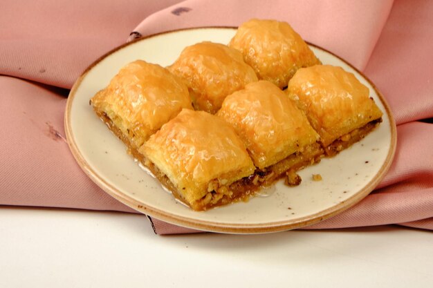 Traditional turkish dessert baklava with cashew walnuts Homemade baklava with nuts and honey