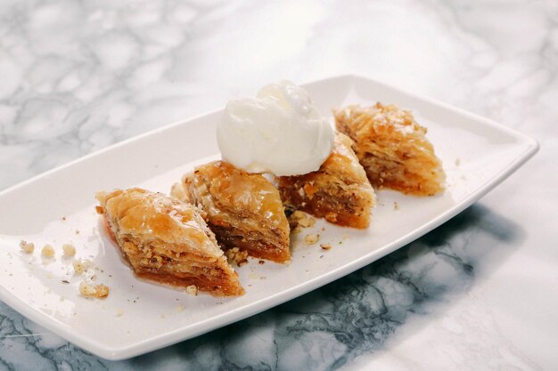 Traditional turkish dessert baklava with cashew walnuts Homemade baklava with nuts and honey