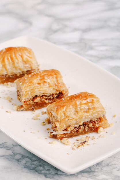 Traditional turkish dessert baklava with cashew walnuts Homemade baklava with nuts and honey