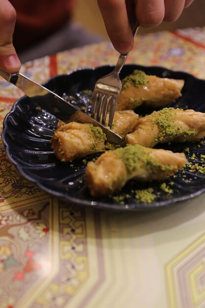 Traditional turkish dessert baklava with cashew, walnuts. Homemade baklava with nuts and honey.