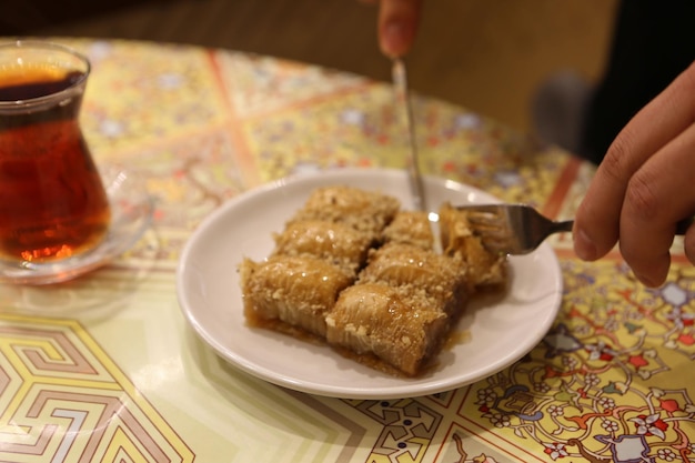 Traditional turkish dessert baklava with cashew, walnuts. Homemade baklava with nuts and honey.