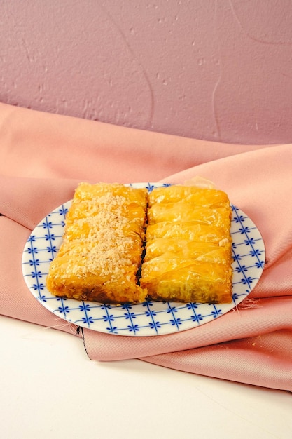 Traditional turkish dessert baklava with cashew walnuts Homemade baklava with nuts and honey