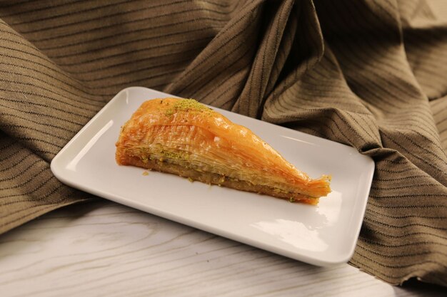 Traditional turkish dessert baklava with cashew walnuts Homemade baklava with nuts and honey