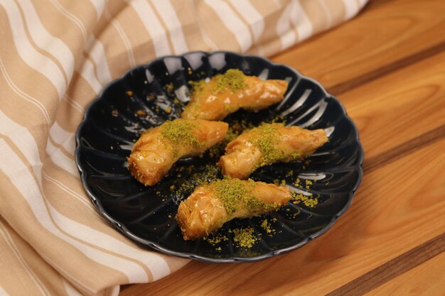 Traditional turkish dessert baklava with cashew walnuts Homemade baklava with nuts and honey