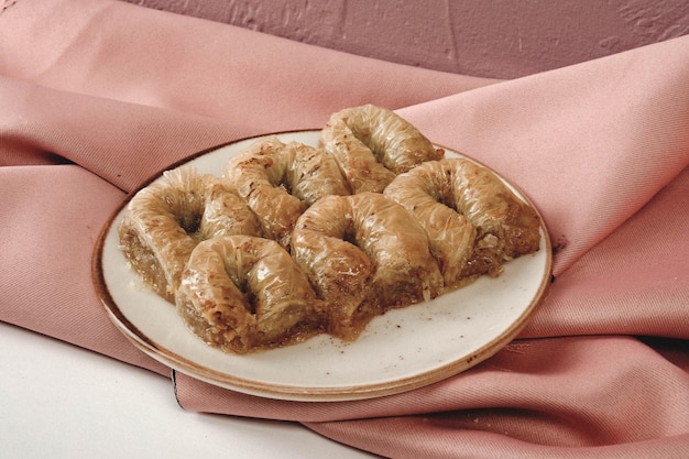 Traditional turkish dessert baklava with cashew walnuts Homemade baklava with nuts and honey