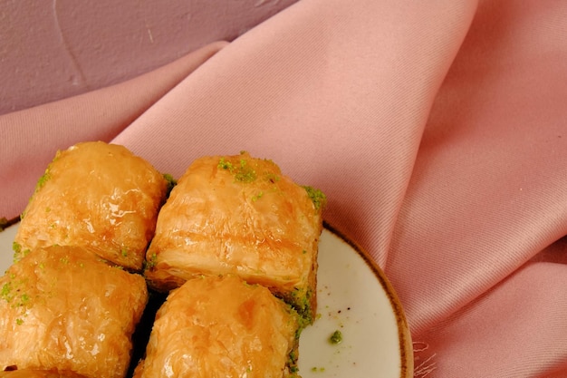 Traditional turkish dessert baklava with cashew walnuts Homemade baklava with nuts and honey