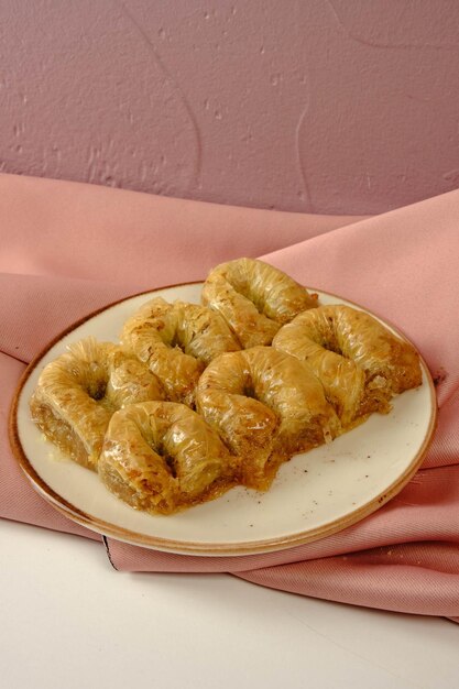 Traditional turkish dessert baklava with cashew walnuts Homemade baklava with nuts and honey