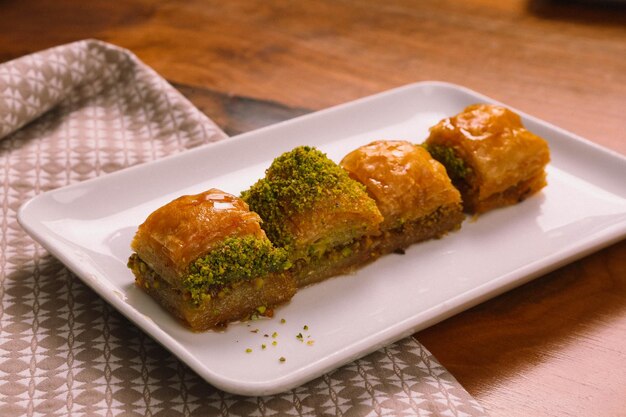 Traditional turkish dessert baklava with cashew walnuts Homemade baklava with nuts and honey