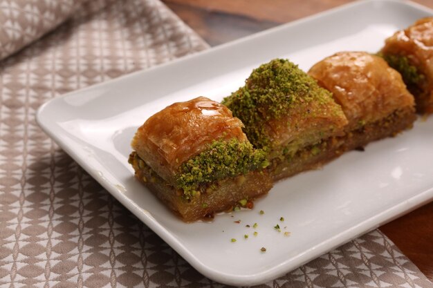 Traditional turkish dessert baklava with cashew walnuts Homemade baklava with nuts and honey