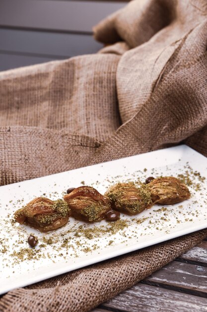 Traditional turkish dessert baklava with cashew walnuts Homemade baklava with nuts and honey