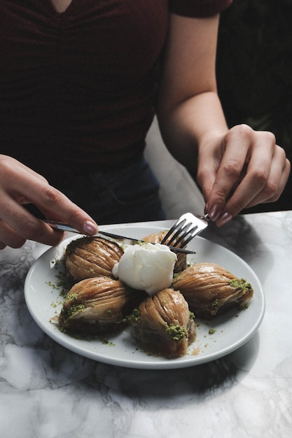 Traditional turkish dessert baklava with cashew walnuts Homemade baklava with nuts and honey