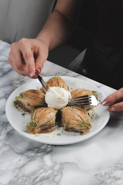 Traditional turkish dessert baklava with cashew walnuts Homemade baklava with nuts and honey