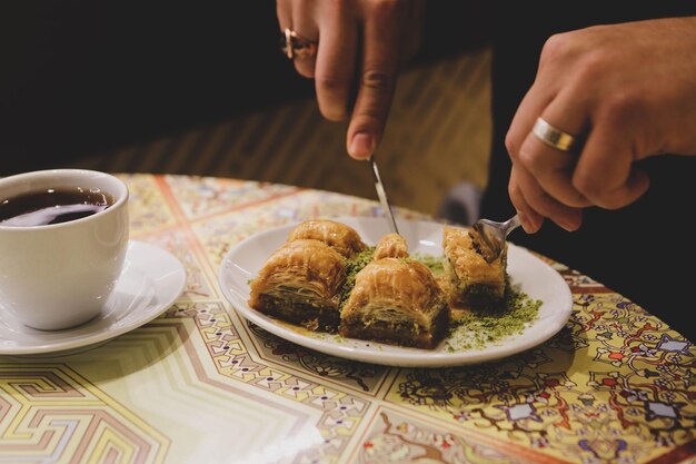 Traditional turkish dessert baklava with cashew walnuts Homemade baklava with nuts and honey