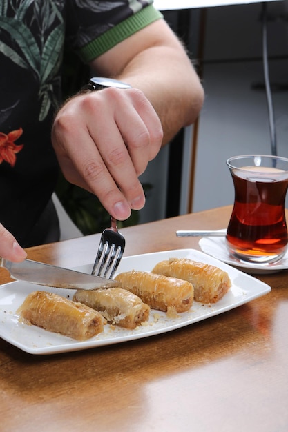 Traditional turkish dessert baklava with cashew walnuts Homemade baklava with nuts and honey