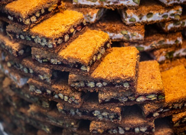 traditional turkish dessert kadayif shredded dough baked in syrup with crushed nuts