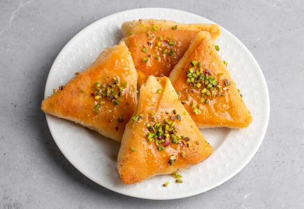 traditional turkish desserts custard triangular dessert albanian dessert turkish name arnavut tatlisi or muhallebili muska tatlisi
