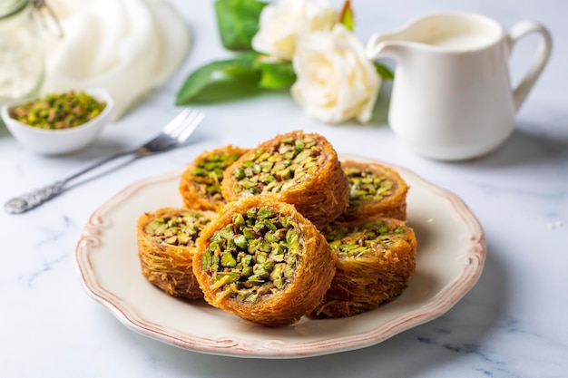 Traditional Turkish desserts; Kadaif stuffed with pistachios. Turkish name; Kadayif dolmasi or dolma kadayif