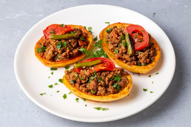 Traditional turkish food baked potato dish with minced meat turkish name patates karniyarik