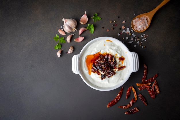 Traditional Turkish and Greek Meze with chili peppers Turkish Appetizer Atom with yogurt Turkish atom meze
