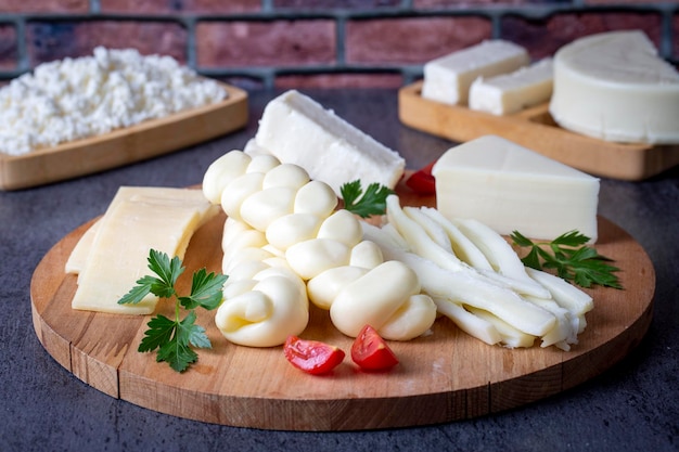 Photo traditional various cheeses string knitted and cecil cheese turkish delicatessen concept