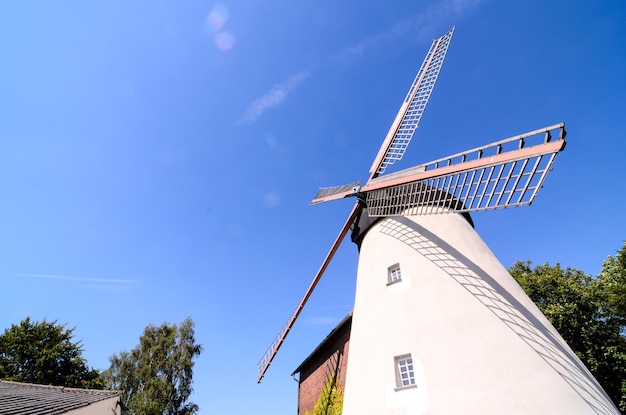 Traditional White Windmill on the Countryside in Germany