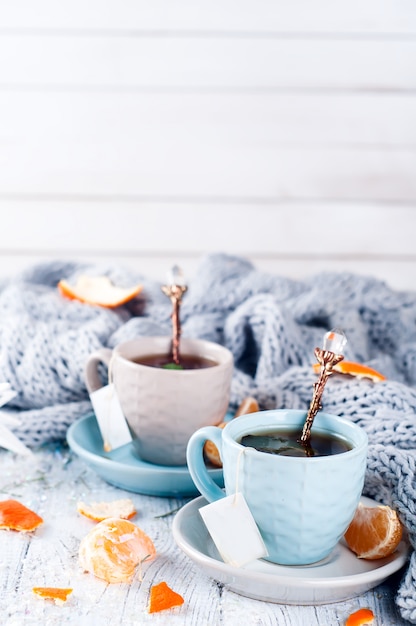 Traditional winter beverage tea with mint and tangerine.