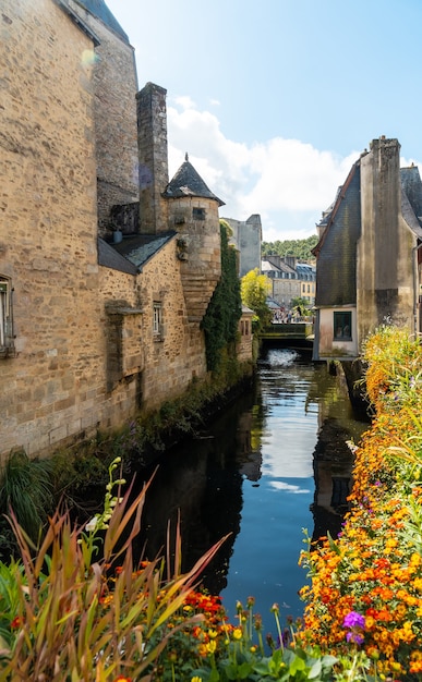 Traditional wooden houses by the river in the medieval town of Quimper in the department of Finisterre. French Brittany, France