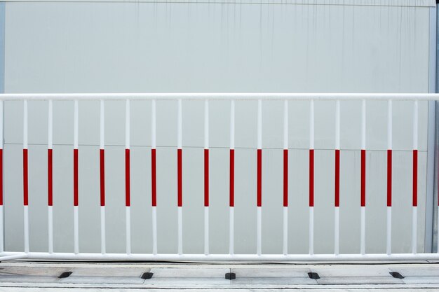 Traffic Barrier made from red and white iron on the road. For not to pass.