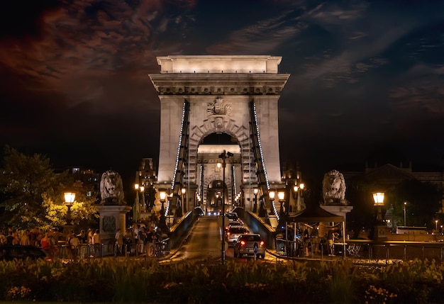 Traffic on Chain Bridge in Budapest at sunset