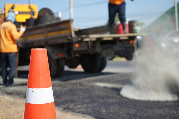 Photo traffic cone on road at construction site