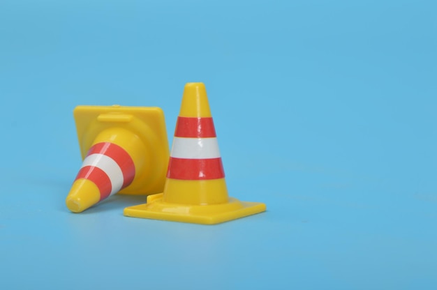 Traffic cones isolated on a blue background