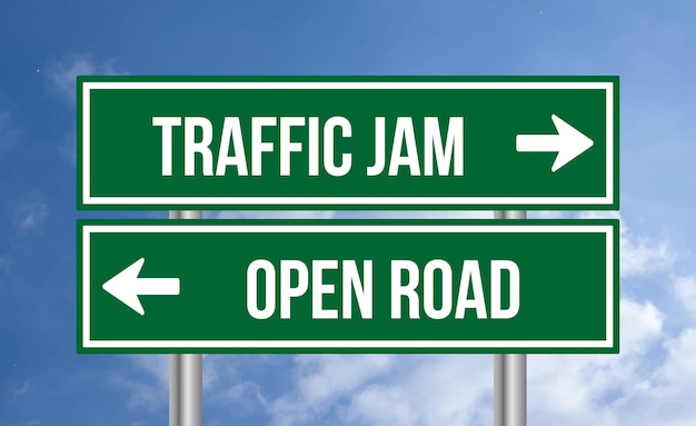 Traffic jam or open road road sign on cloudy sky background