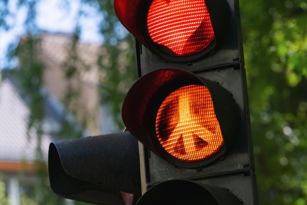 Traffic light with red heartshape Peace sign