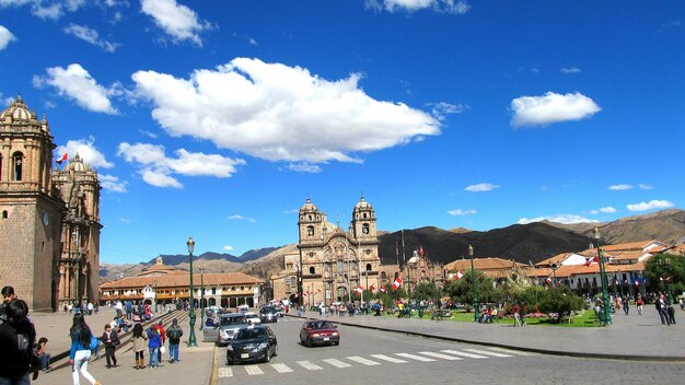 Traffic on road with cathedral in background